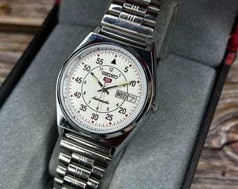 Vintage Seiko 5 automatic Black dial Day-date window stainless steel strap working order