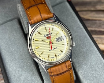 Refurbished Seiko 5 automatic caliber 6309 17 jewel's cream gold Dial Day-date window