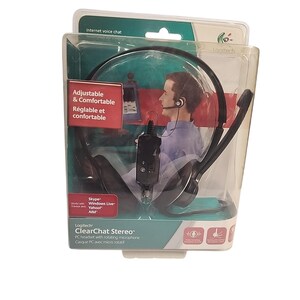 May include: Black Logitech ClearChat Stereo PC headset in a clear plastic package. The headset has a rotating microphone and is labeled as adjustable and comfortable. The package also mentions compatibility with Skype, Windows Live, Yahoo, and AIM.