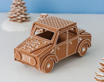 May include: A brown gingerbread car featuring white icing details, including a cross-hatch pattern on the roof, intricate scrollwork on the hood, and outlines defining the windows, doors, wheels, and front grille, crafted as a decorative item.