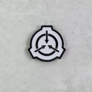 May include: A white and black embroidered patch featuring the SCP Foundation logo. The logo is a stylized circle with three inward-pointing arrows and a central downward arrow, all within a black border.
