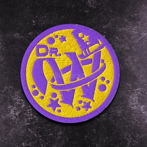 May include: A circular embroidered patch featuring a bright yellow background with a purple border. The design includes the purple text DR. JAZZ in a stylized font, surrounded by purple star and circle shapes scattered across the yellow surface.