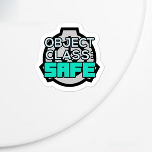 May include: A circular sticker featuring a gray and black emblem with a stylized design. The text reads OBJECT CLASS: in black letters, followed by the word SAFE in large, bold, bright teal capital letters centered within the emblem design.
