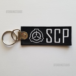 Schwarz SCP Bestickter Schlüsselanhänger, 10 cm