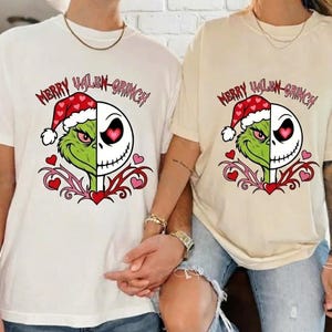 May include: Two t-shirts, one white and one cream, feature a graphic of the Grinch and Jack Skellington in a Santa hat with the text "Merry Valen-Grinch". The design includes hearts and decorative swirls.