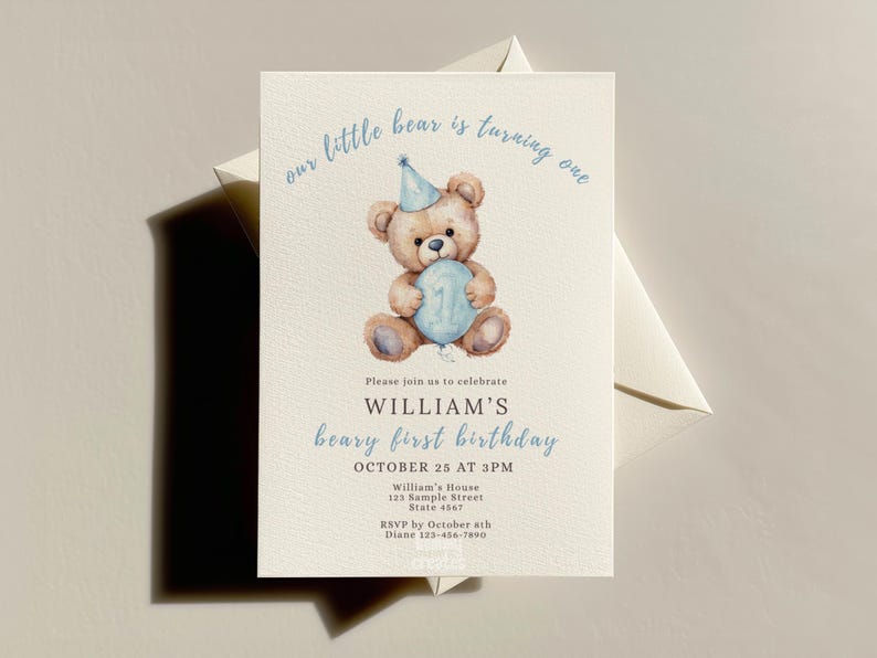 May include: A light beige birthday invitation with a watercolor illustration of a teddy bear holding a blue number one balloon. The text reads "Our little bear is turning one" and "William's beary first birthday". Includes event details.