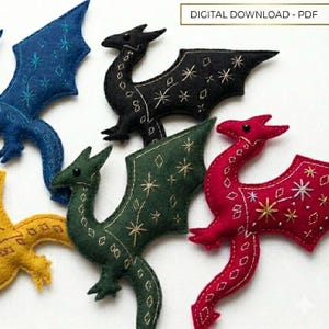 May include: A selection of felt dragon ornaments in shades of blue, black, green, red, and yellow. Each dragon is adorned with embroidered star and diamond patterns. The text "DIGITAL DOWNLOAD - PDF" is displayed.