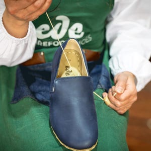 Grounding barefoot shoe for the man who values craft, posture, health and earth connection.
