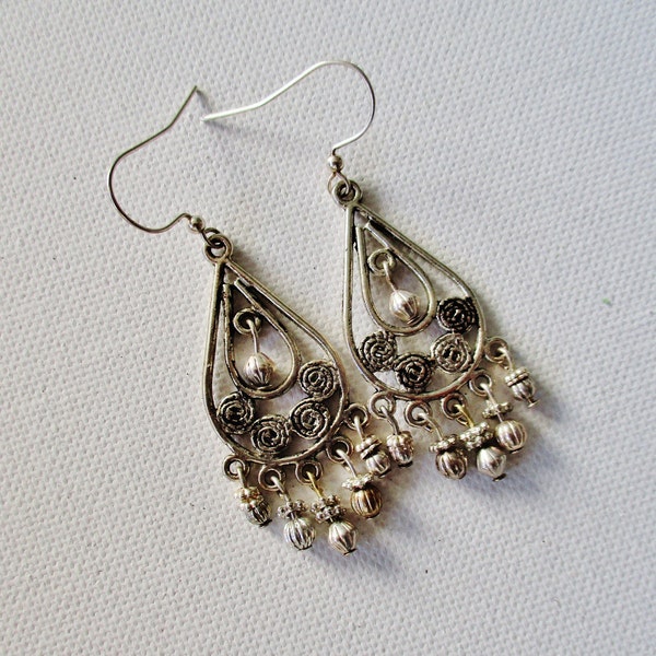 Long silver gypsy artisan bohemian chandelier earrings a great splash of silver to go with any outfit a unique jewelry gift for any occasion