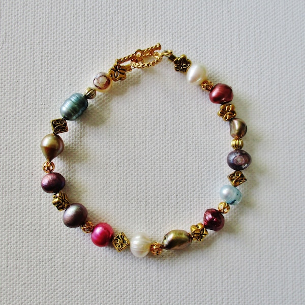 Colorful artisan handmade freshwater pearl gold bracelet, brimming with fresh color a perfect piece for summer and a unique jewelry gift