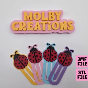 May include: A collection of ladybug-themed bookmarks in yellow, pink, blue, and purple. Each bookmark features a red ladybug design with black spots and antennae. The image also includes the text "MOLBY CREATIONS", "3MF FILE", and "STL FILE".