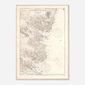 May include: A vintage map print titled "EIGNEIG MORE to BLACK LEVERBAY" in a light wood frame. The map features detailed coastlines, land formations, and navigational elements, rendered in sepia tones. The print has a classic, aged aesthetic.