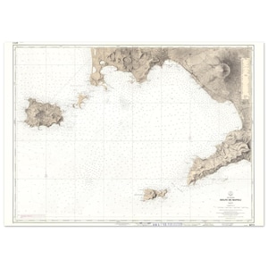 May include: A vintage nautical chart of the Gulf of Naples, Italy, with detailed topographical features and depth soundings. The map is in sepia tones, with the title "Golfe de Napoli" visible. The chart is framed with a white border.