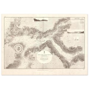 May include: Vintage nautical chart of Loch Alsh and Loch Duich, with detailed topographic and hydrographic information. The map is printed in sepia tones, showing intricate details of the coastline and sea depths. Includes a compass rose and navigational elements.