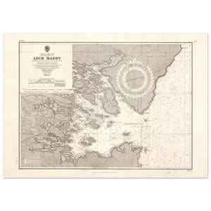 May include: A vintage nautical chart of Loch Maddy, featuring detailed topographic and bathymetric information. The map is in shades of gray and beige, with text indicating the location and other navigational details. A compass rose is prominently displayed.