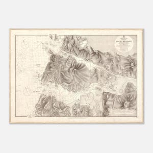 May include: A vintage-style monochromatic nautical chart titled Loch Moidart, featuring detailed topographical shading of the Scottish coastline, depth soundings, compass roses, and descriptive text blocks printed on a light beige background.