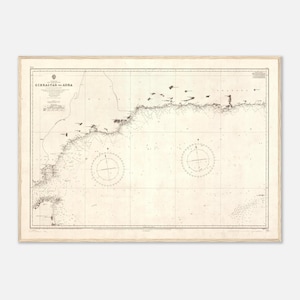 May include: A vintage nautical chart titled Gibraltar to Adra, printed in black ink on a light beige background. The map features detailed coastal outlines, depth soundings, two large compass roses, and grid lines across the entire surface.