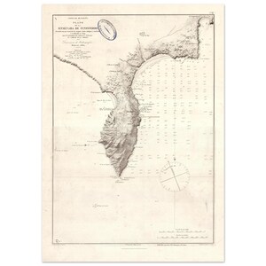 May include: Vintage nautical chart of the Ensenada de Finisterre, showing detailed coastal features and depth soundings. The map is in monochrome, with fine lines and text, and includes a compass rose and a blue stamp.