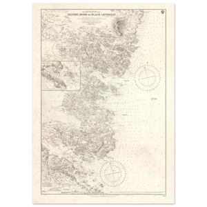 May include: Vintage nautical chart titled "EDGIEIC MORE TO BLACK LEVERSAY" in sepia tones. The detailed map features coastlines, islands, and navigational elements, including compass roses. A smaller inset map is also present.