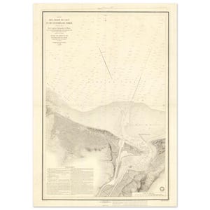 Puede incluir: Un mapa náutico antiguo, con cartografía detallada de una región costera. El mapa está impreso en papel envejecido, con texto en francés. El título del mapa es visible en la parte superior, y la estética general es vintage.