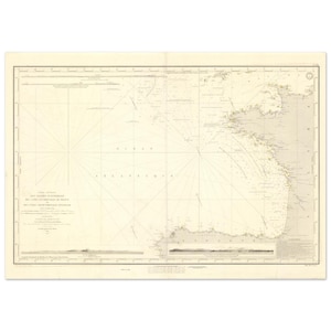 Peut inclure: Une carte nautique ancienne avec des côtes et des profondeurs océaniques détaillées. La carte est imprimée sur du papier vieilli avec du texte en français, représentant l'océan Atlantique. La carte présente un quadrillage et des lignes de compas.