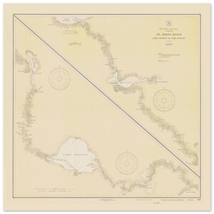 May include: A vintage nautical chart of the St. Johns River, Lake George to Lake Harvey, Florida. The map features detailed illustrations of the river and surrounding areas, with compass roses and text. The chart is printed on aged paper with a cream-coloured background.