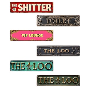 May include: A white ceramic mug with a black handle and the text "But First, Coffee" in a bold, black font. The mug is set against a blurred background, suggesting a cozy setting. The mug appears to be approximately 4 inches tall.