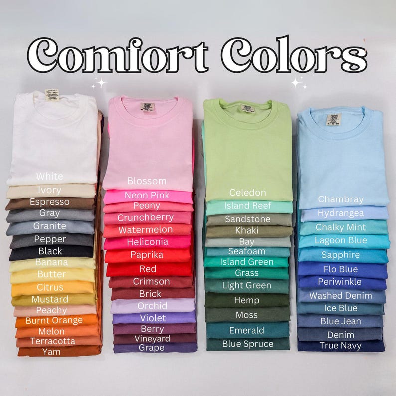 May include: Stacks of Comfort Colors t-shirts in various colors, including white, pink, green, and blue. Each stack displays a folded t-shirt with a color name label. The image features the text "Comfort Colors" at the top.