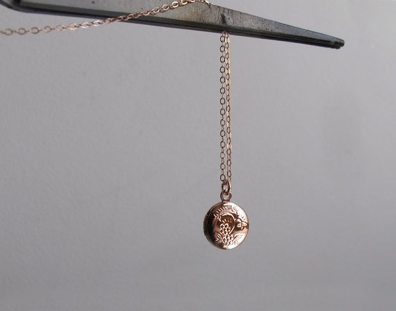 small gold locket necklace
