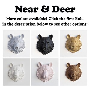 a group of different colored animal heads on a white background