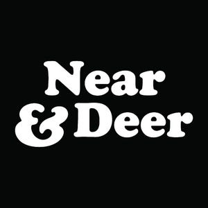 the text "Near & Deer" in a stylized font against a black background.