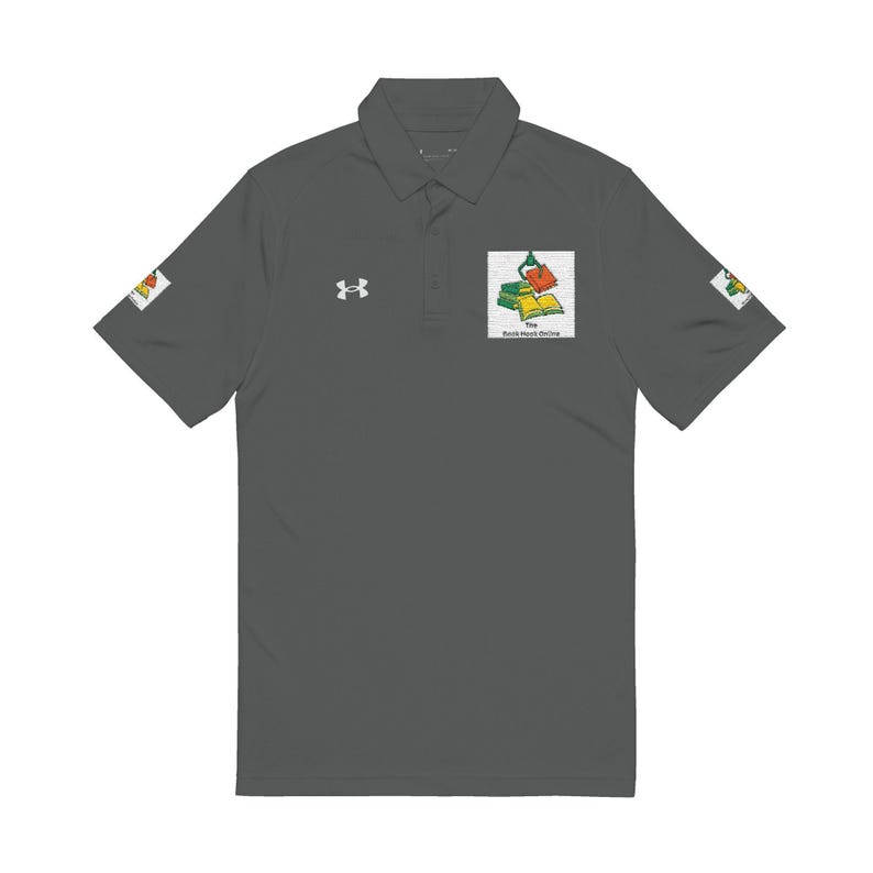 A dark gray short-sleeve polo shirt with the logo of stacked books on the chest, an Under Armour logo, and sleeve patches.