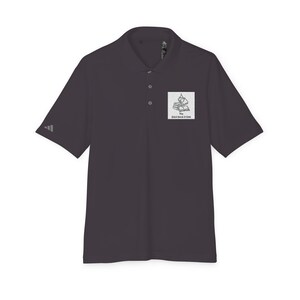A dark grey short-sleeve polo shirt with a collar, three buttons, and a small book graphic on the left chest.