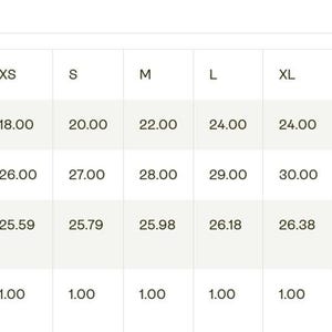 A size chart table with imperial measurements for width, length, and sleeve length across sizes XS to 3XL.