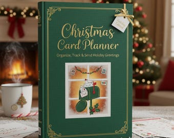 May include: A green Christmas Card Planner with gold lettering and accents. The cover features the words "Christmas Card Planner" and an illustration of a mailbox with holiday cards. A tag that says "Holiday Edition" is attached with a gold ribbon.