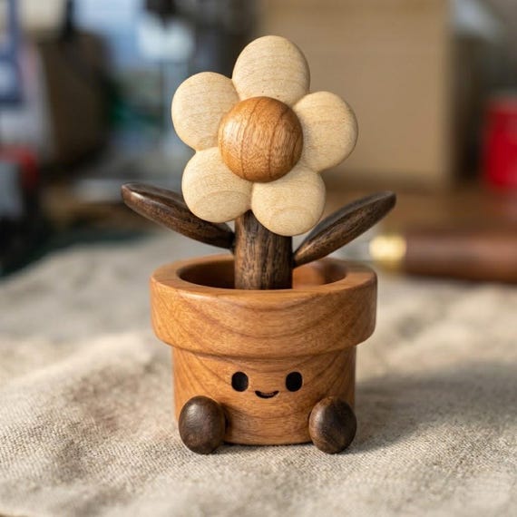 A multi-wood spinning flower that doubles as a fidget toy — beautiful enough to display, satisfying enough to actually spin when you're thinking.