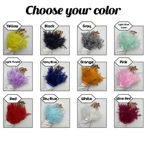 May include: An image showcasing a variety of feather wrist cuffs in multiple colors. The text "Choose your color" is at the top. Colors include yellow, black, gray, light blue, green, light purple, navy blue, orange, pink, red, sky blue, white, and wine red.