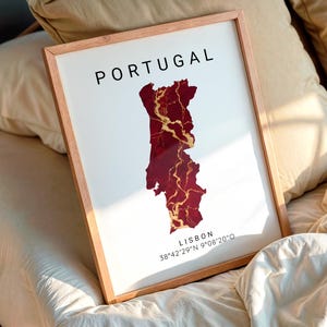 May include: A white ceramic mug with a black handle and the text "But First, Coffee" in a black, handwritten-style font. The mug is on a white surface.