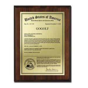 May include: A framed patent certificate from the United States Patent and Trademark Office. The certificate is for GOGOLF, registered November 27, 2018. The certificate is on a gold-colored plate with black text, set in a dark wood frame.