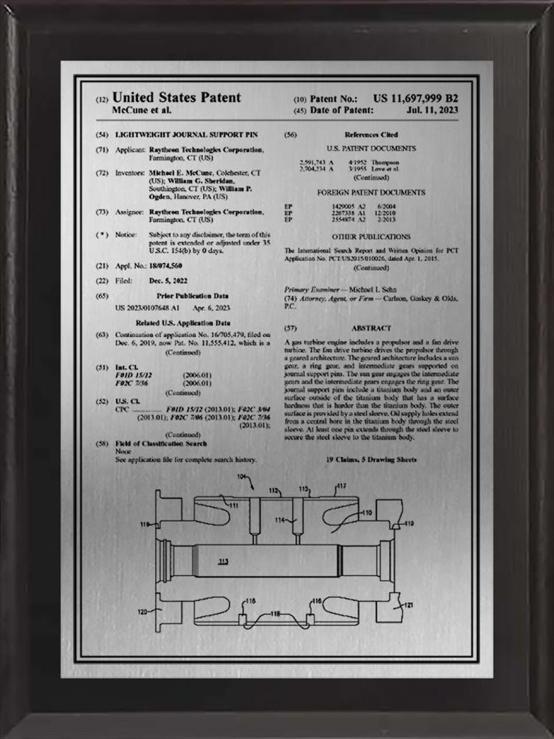 May include: A framed United States patent document, US 11,697,999 B2, dated July 11, 2023, for a lightweight journal support pin. The document includes text, diagrams, and references to related patents. The patent is assigned to Raytheon Technologies Corporation.