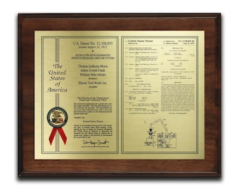 May include: A framed United States patent plaque with a gold-colored plate and a dark wood frame. The plaque includes the U.S. Patent number, the names of the inventors, and the title "EXTRACTOR WITH SEGMENTED POSITIVE PRESSURE AIRFLOW SYSTEM."