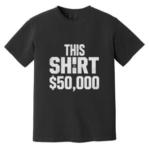 Puede incluir: Camiseta negra con el texto blanco "THIS SHIRT IS $50,000". El texto est&aacute; en letras blancas de estilo desgastado. La camiseta tiene cuello redondo y mangas cortas. La tela parece ser una mezcla de algod&oacute;n suave.
