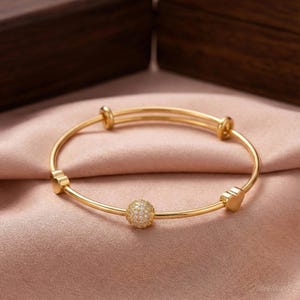 Bracelet jonc épais à charnière - Doré - FEMME | H&M FR