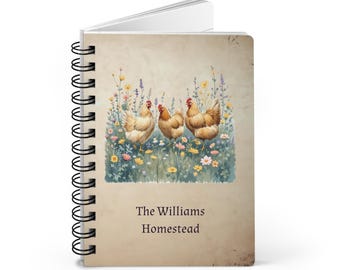 May include: A spiral-bound notebook with a watercolor illustration of three chickens in a field of wildflowers. The notebook cover has a vintage, textured appearance and includes the text "The Williams Homestead".