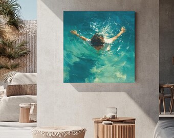 May include: A square canvas print depicts a person swimming in turquoise water, arms outstretched. The artwork is displayed on a neutral-toned wall, complemented by wooden furniture and a woven ottoman. The scene evokes a sense of tranquility and leisure.