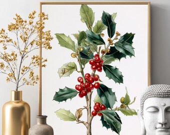May include: A framed botanical print featuring a watercolor illustration of a holly branch with green leaves and vibrant red berries. The artwork is displayed in a gold frame, evoking a classic and festive aesthetic. The image is set against a white background.