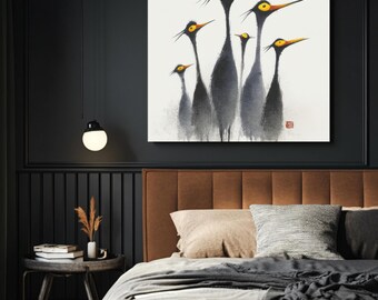 May include: A framed art print featuring a watercolor painting of six stylized birds with long necks and yellow eyes. The birds are depicted in shades of gray against a white background. The artwork is displayed above a bed with brown headboard.