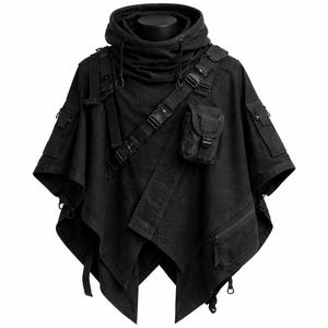 May include: Black hooded poncho with multiple pockets and straps. The garment features a high collar, a hood with a drawstring, and a cross-body strap with a small pouch. The design includes multiple zippered pockets and adjustable straps.