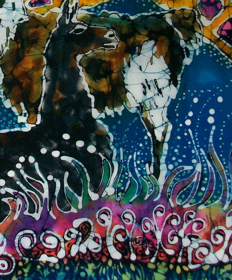 May include: A batik painting featuring a black and white llama with a blue and white background. The llama is surrounded by colorful flowers and plants.
