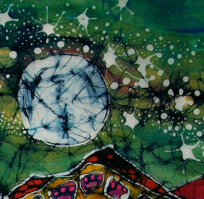 May include: Abstract batik painting with a large white circle in the center, surrounded by green, blue, and white swirls and dots. The bottom of the painting features a red, yellow, and black design with pink accents.